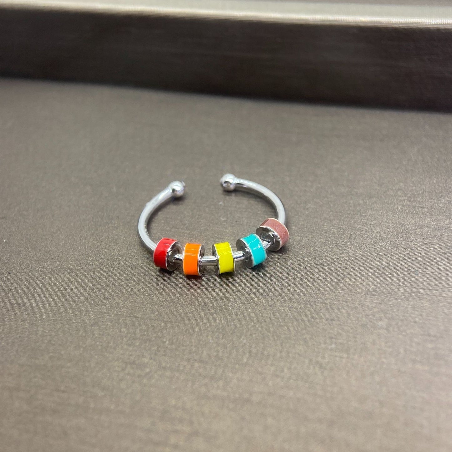 Rotating Enamel Fingertip Stress Relief Ring